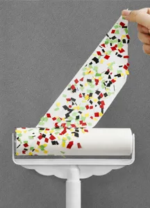 Long handle lint roller with diagonal tear design, perfect for pet hair and dust removal.
