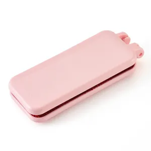 Portable folding double-sided pet hair remover lint brush for clothes and furniture cleaning.