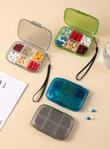 Portable 6-grid pill box travel medicine organizer small weekly vitamin storage container.