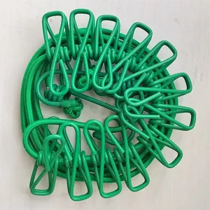 Portable outdoor elastic clothesline with clips detail view for travel laundry use