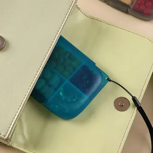 Portable 6-grid pill box travel storage container weekly medicine organizer with lanyard.