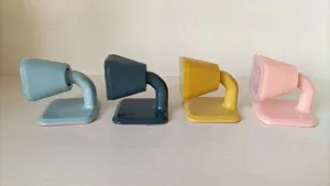 Silicone door stopper detail view showing four colorful magnetic door stops for home use.