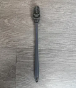 Silicone long handle cup brush detail view, flexible cleaning brush for bottles and glassware.