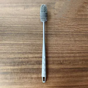 Silicone long handle bottle brush detail view, flexible cleaning brush for cups and mugs.
