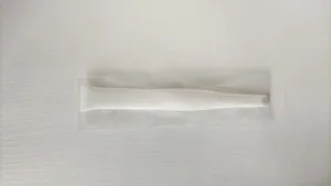 Detailed view of the white plastic cleaning scraper tool in transparent packaging bag.