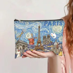 Close-up detail of a vintage oil painting print makeup bag with Paris starry night design