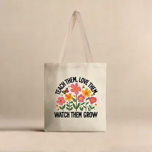 Bolsa de tela con estampado floral y cita inspiradora Teach Them Love Them.