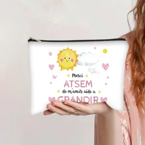 Close-up of white canvas pouch with cartoon sun and French teacher appreciation text