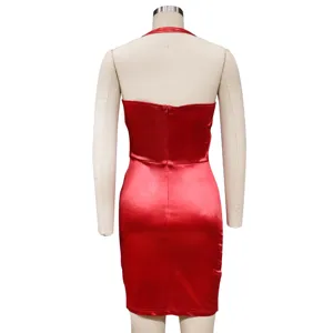 Red satin halter dress back detail, slim fit sleeveless bodycon dress fabric texture.