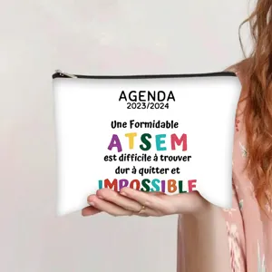 Detail view of canvas makeup bag with French teacher appreciation text design