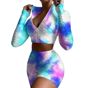 Women tie dye long sleeve zip crop top shorts activewear set detail view showing textured fabric.