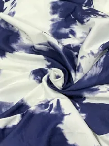 Blue and white tie dye print fabric detail for women casual trousers, soft and stylish material.