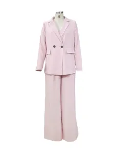 Detailed view of the pink long-sleeve blazer and trousers two-piece set, elegant style.