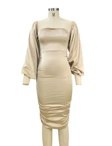 Square neck long puff sleeve ruched detail of solid color bodycon dress close up view.