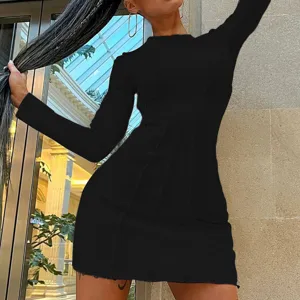 Black long sleeve bodycon dress with exposed seam stitching details, stylish fitted apparel.