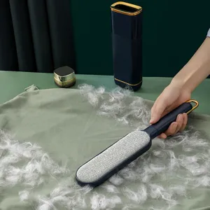 Double-sided electrostatic lint remover brush for clothes and furniture cleaning, dark blue