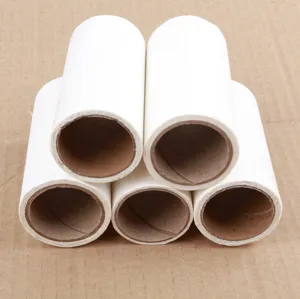 White adhesive lint roller refill rolls for pet hair removal, practical daily cleaning tool.
