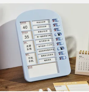 Tabella delle faccende e pianificatore di apprendimento per bambini con pulsanti scorrevoli.