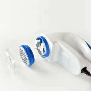 Electric fabric shaver and lint remover with plug-in design for clothes and sweaters.