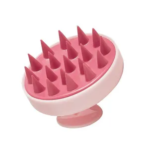 Silicone scalp massage shampoo brush detail view, soft bristles for newborn baby hair care.