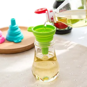 Collapsible silicone funnel for kitchen liquid oil transfer, portable eco-friendly foldable tool.