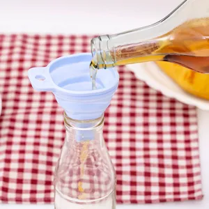 Collapsible silicone funnel for kitchen liquid dispensing, portable folding mini oil funnel tool.