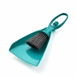 Mini desktop dustpan and brush cleaning set, compact size for keyboard and drawer cleaning.