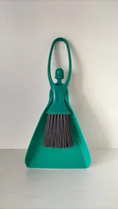 Creative mini desktop cleaning brush and dustpan set with cute dancing girl shape design.