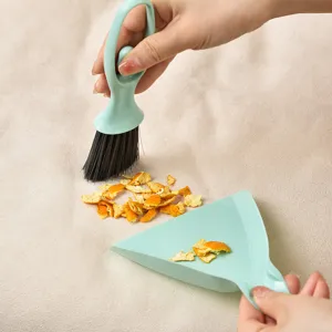 Mini broom and dustpan set for desktop keyboard cleaning, small household cleaning tool.