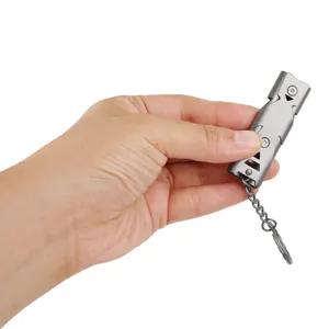 Stainless steel survival whistle detail, compact EDC tool feature for outdoor safety gear.