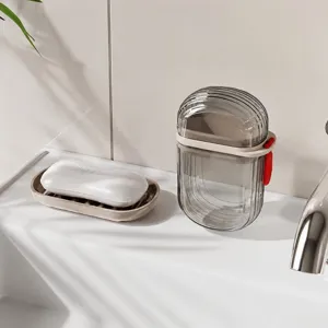 Portable travel soap box with lid, transparent black waterproof soap holder for home.