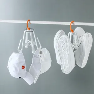 Multifunctional rotatable shoe and hat drying rack, windproof plastic storage hanger for home.
