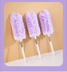 Close-up details of the purple fluffy telescopic cleaning duster showing fine texture.