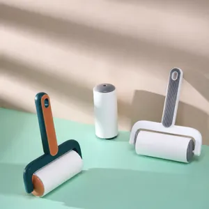 Detail view of the colorful lint roller with a replaceable inner core and dust cover.