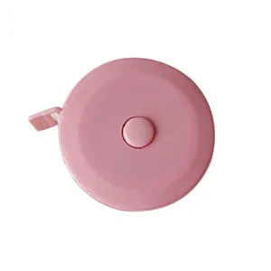 Metro a nastro retrattile rosa compatto per misurazioni di abiti, mini righello portatile.