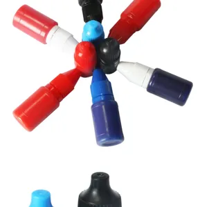 Detailed view of colorful plastic dropper bottles for quick-drying stamp ink consumables.