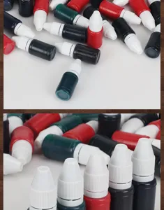 Detailed view of colorful quick-drying stamp ink refill bottles, 10ml liquid supply.