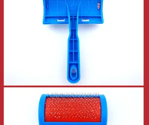 Detailed view of blue pet slicker brush with stainless steel pins for grooming cat and dog hair.