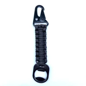 Outdoor black paracord keychain with carabiner clip and integrated bottle opener.