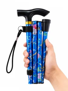 Detailansicht des leichten, faltbaren Gehstocks mit blauem Blumenmuster und ergonomischem Griff.