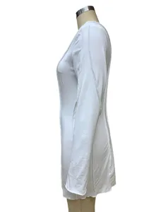 Detailed side view of a white long sleeve slim fit dress featuring visible seam lines.