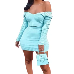 Light blue ribbed knit two-piece set, off-shoulder crop top and mini skirt detail view.