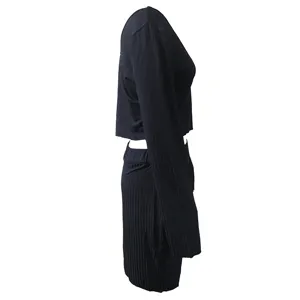 Black ribbed long sleeve crop top and mini skirt set side view detail shot for women fashion.