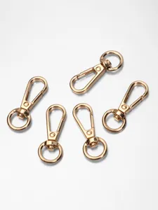 Mosquetón giratorio de aleación de zinc dorado para llaveros y accesorios de bolsos.