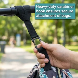 Close-up detail showing heavy-duty stroller carabiner hook securely holding shopping bags.