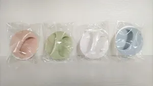 Detail view of assorted colorful cabinet handles in individual protective plastic bags.