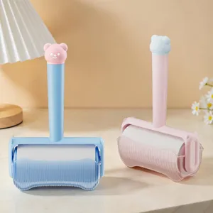 Cute bear lint roller with dustproof case, portable sticky hair remover for clothes and pets.