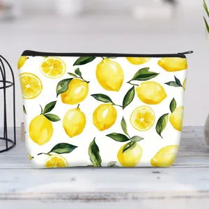 Large capacity canvas makeup bag with watercolor lemon print and black zipper closure.