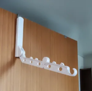 Portable folding clothes hanger for dorm room door, 5-hole wall mounted drying rack for travel.