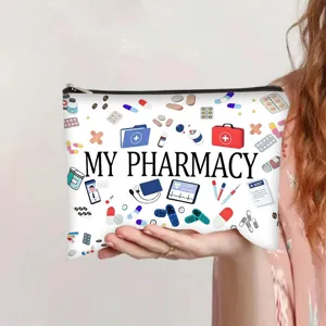 Detail view of a cartoon canvas makeup bag with medical pharmacy print held in hand